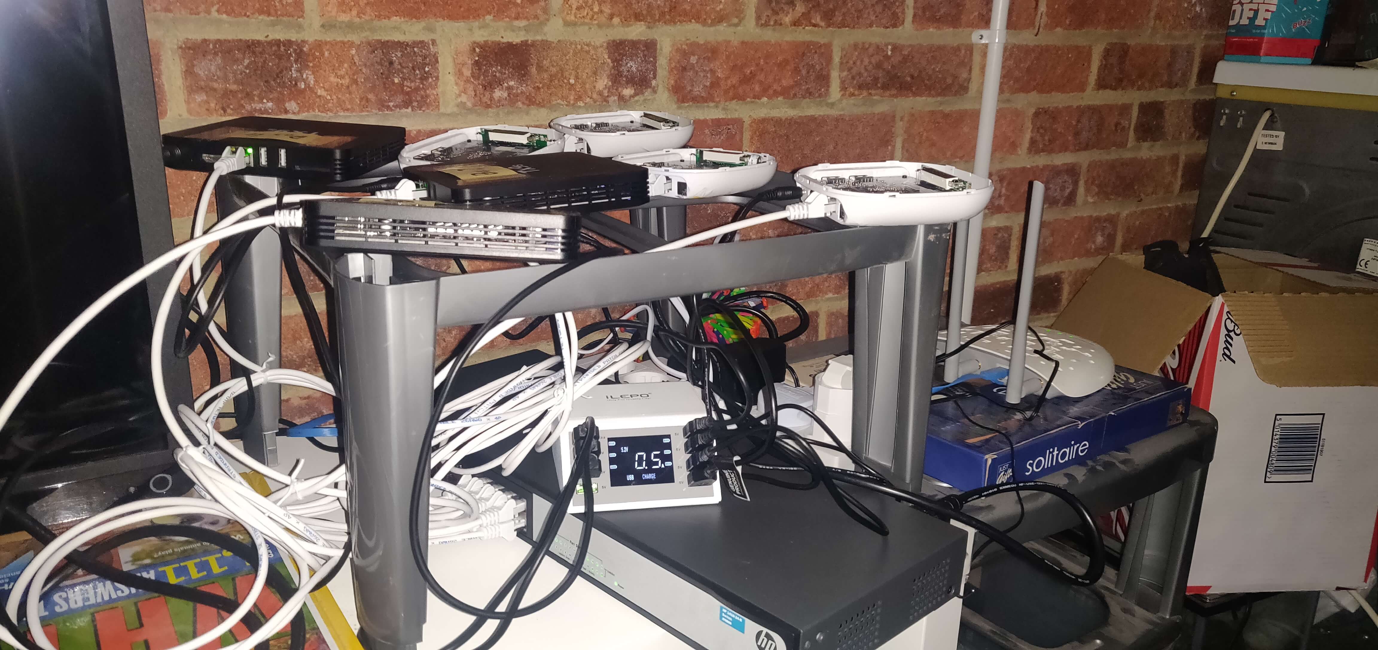 The same frame, now balancing an additional 3 A95X F1's. Additionally an upgraded network switch for all the connections with a USB powered hub displaying power usage.