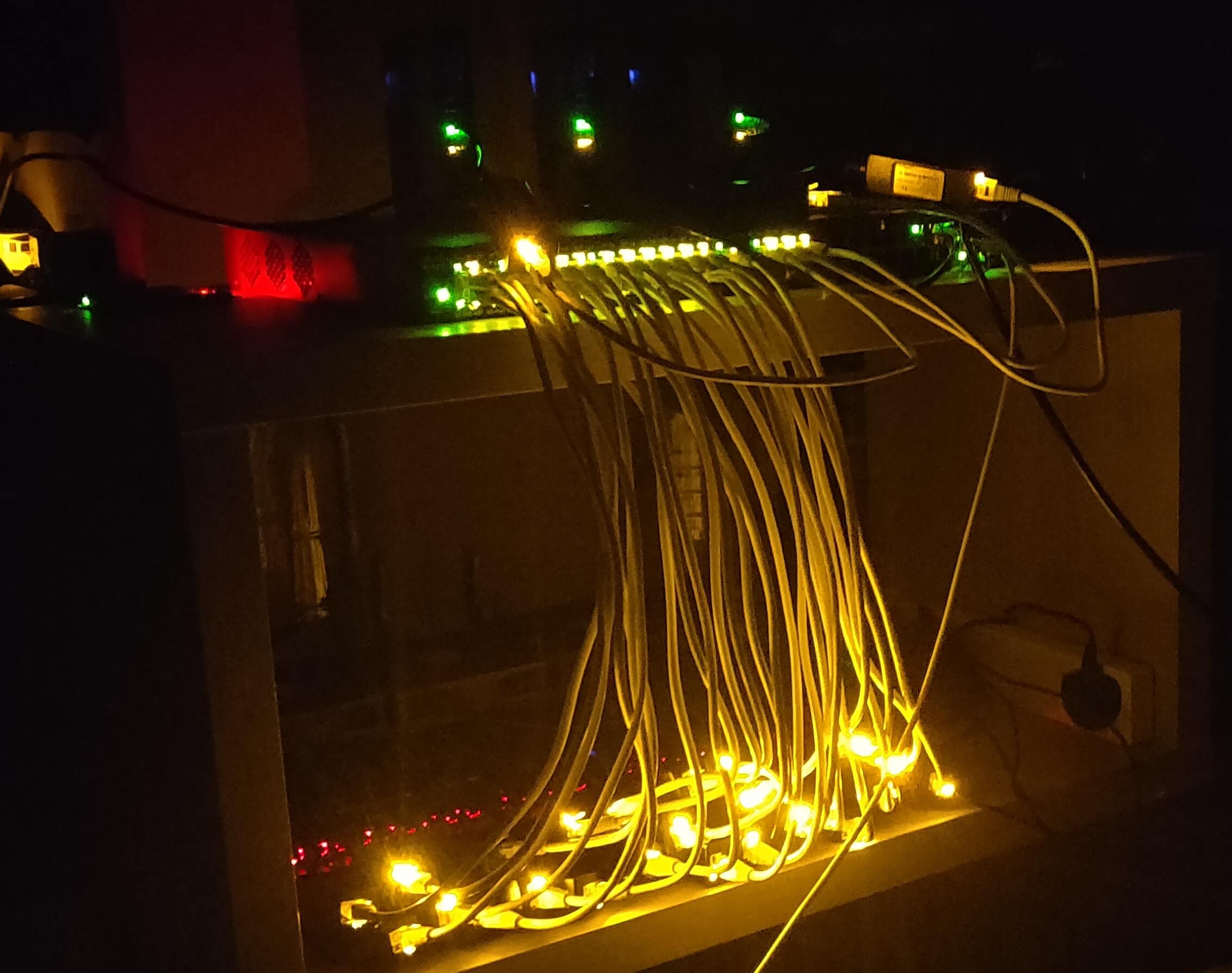 Lights out image of the 32 port switch with all the android boxes. 